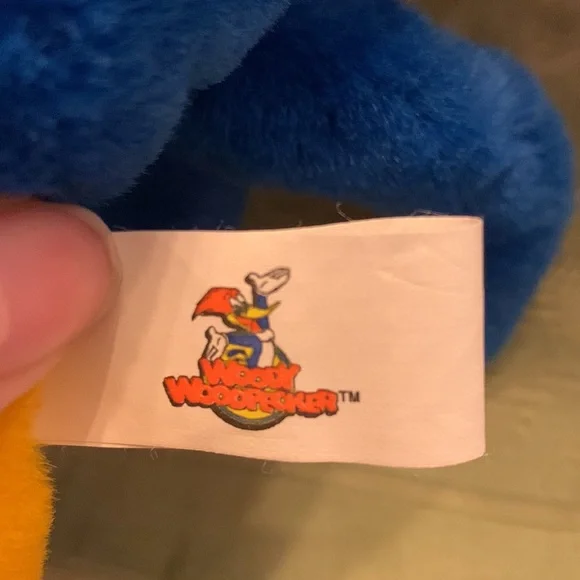 Charming Nostalgia: Woody Woodpecker Plush Collectible Cartoon Character.